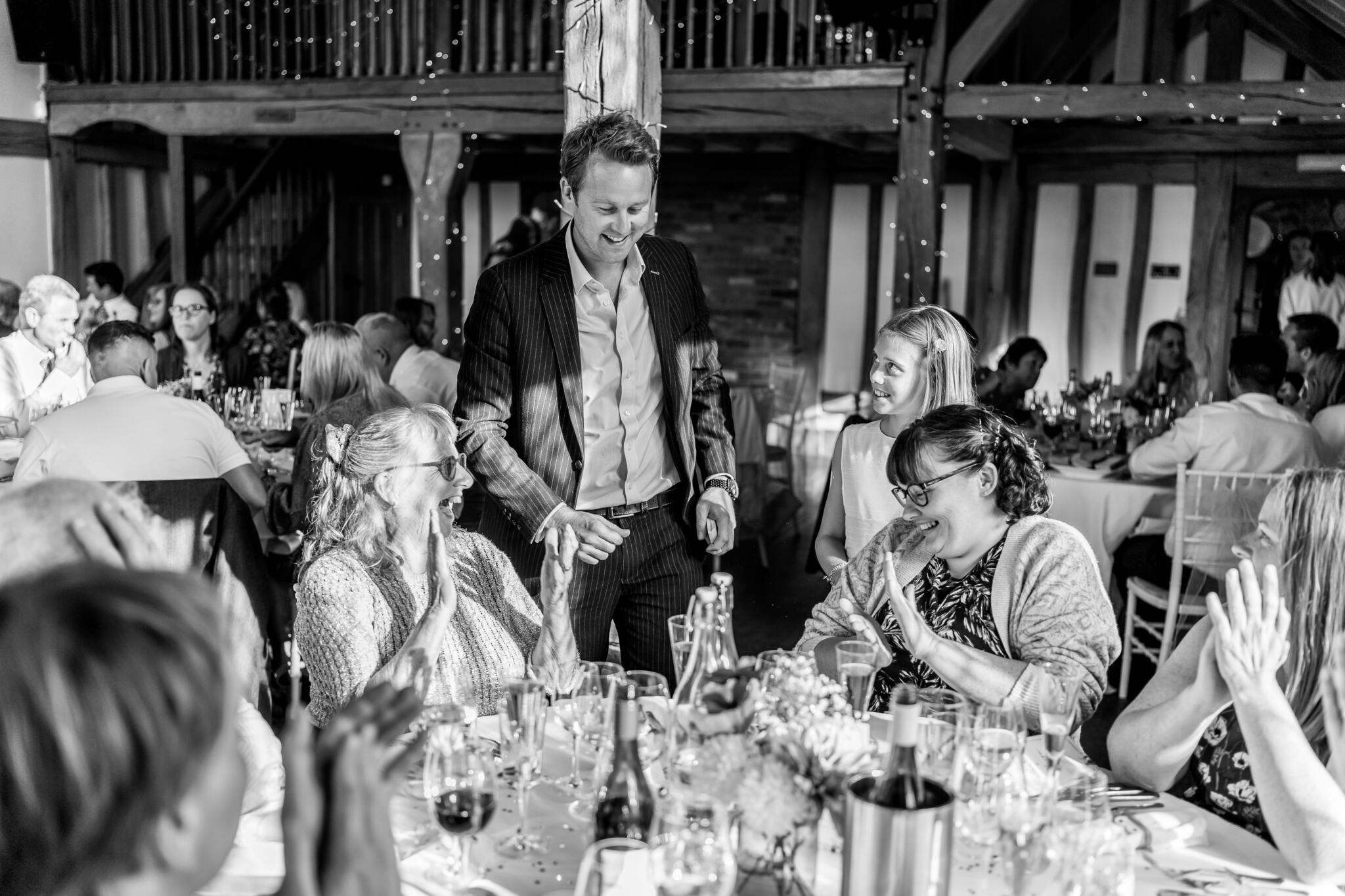 Surrey-wedding-magician-richard-kettle-performing-table-magic Surrey-wedding-magician-richard-kettle-performing-table-magic